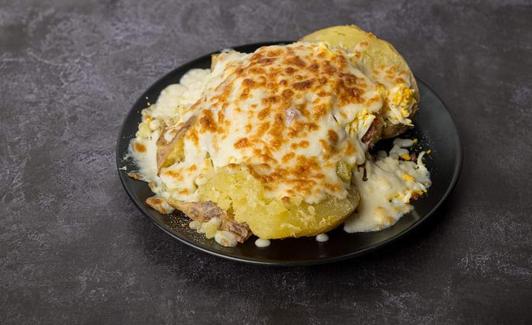 La patata gratinada al horno de Papas Fortuny.