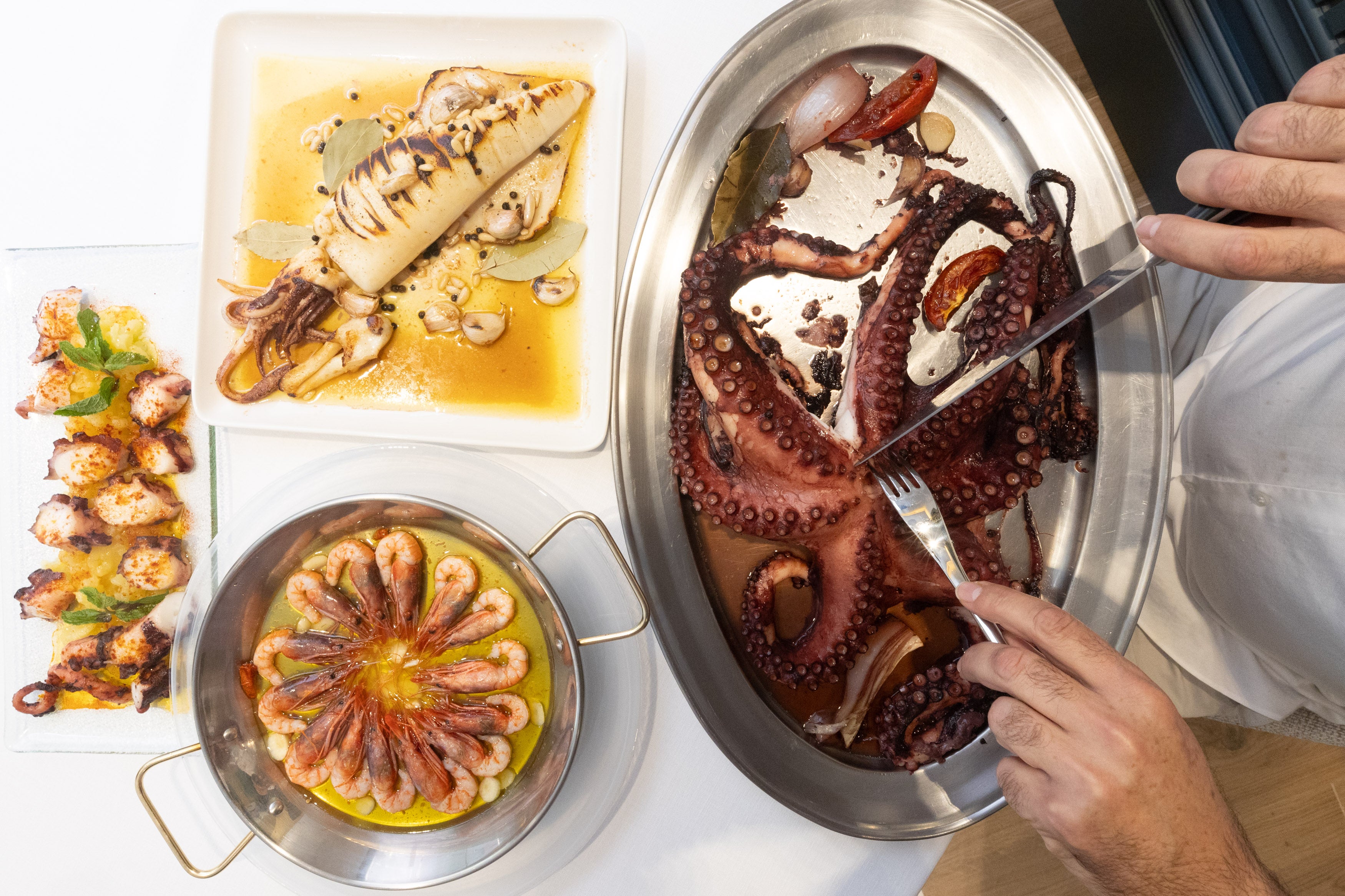 El pulpo, el calamar y las gambas al pil pil de Restaurante Medinaceli; formas diferentes y originales de tomar los pescados de siempre.