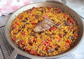 Arroz con presa ibérica y pimientos rojos