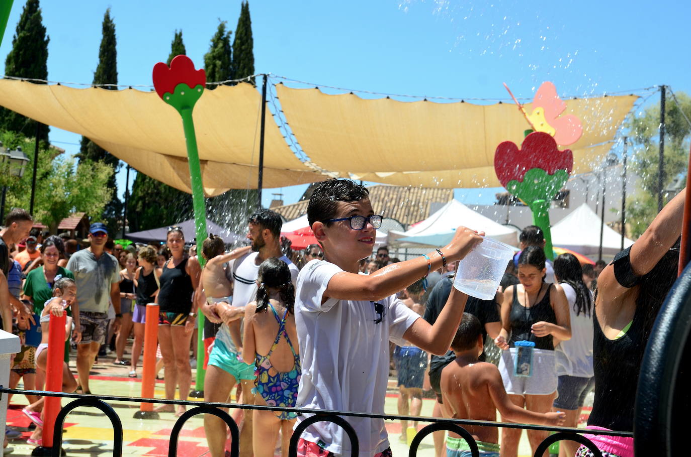 San Roque humedece el barrio de Caicena de Huétor Vega