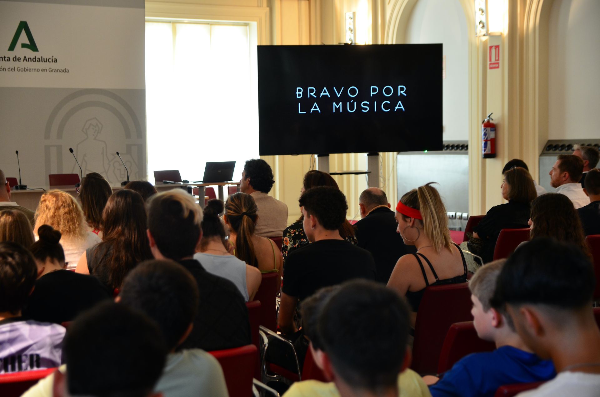 Acto de presentación del proyecto educativo 'Bravo por la Música', en Granada.