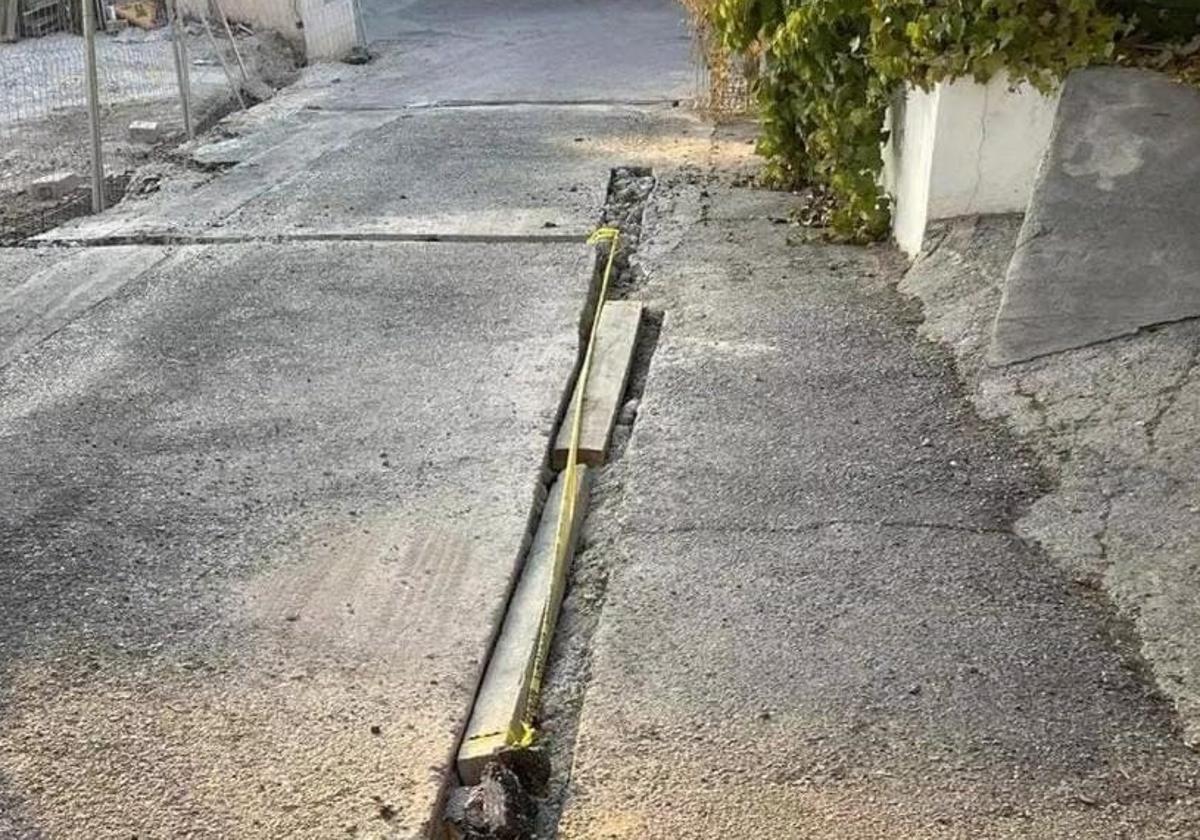 Imagen difundida de la supuesta calle en mal estado.