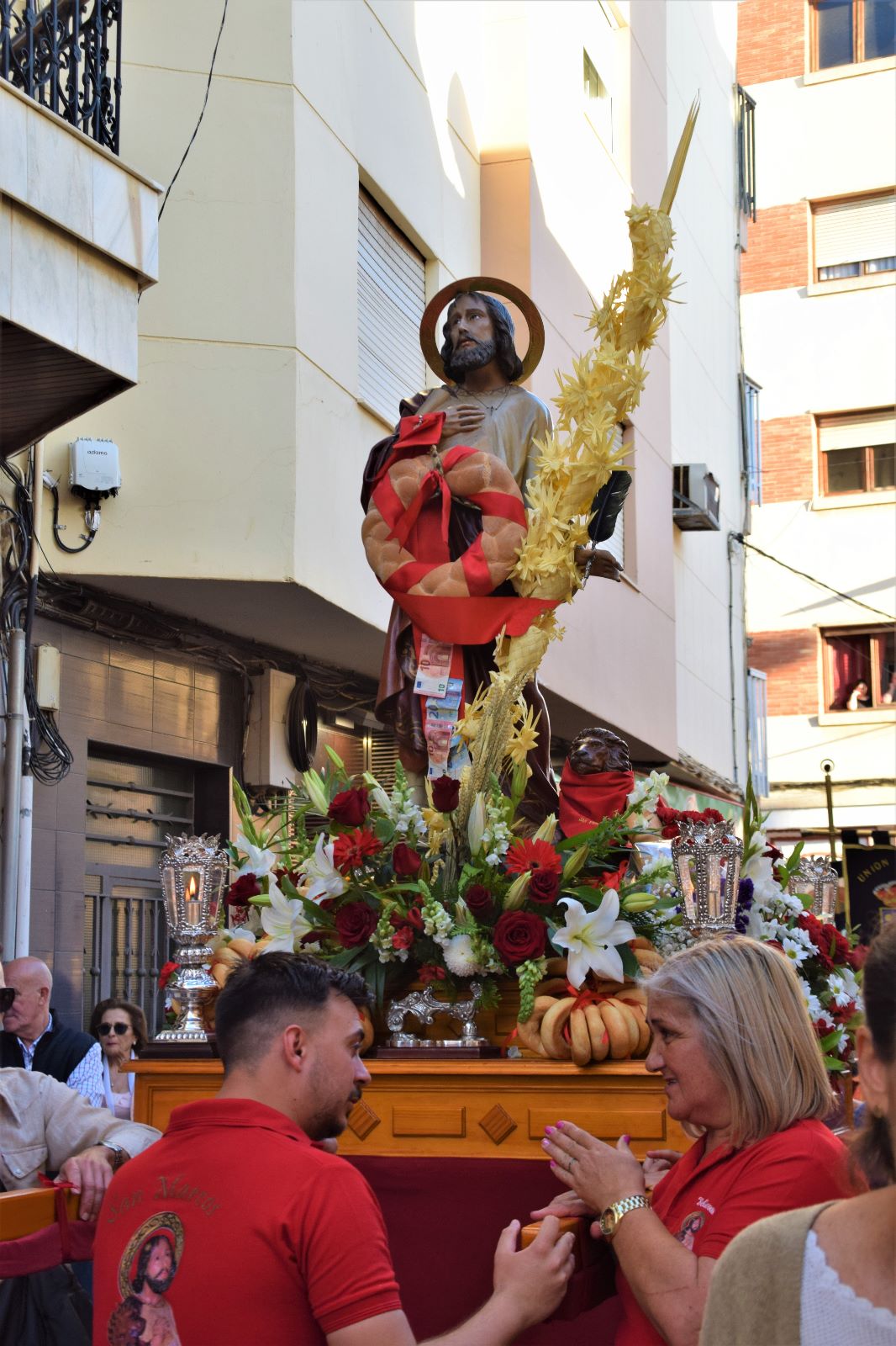 San Marcos procesiona por las calles de Roquetas