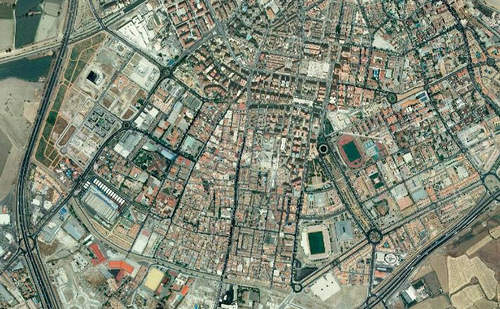 El Zaidín en la actualidad es una masa cementada mientras que en 1956, solo había campos y la barriada de Santa Adela.