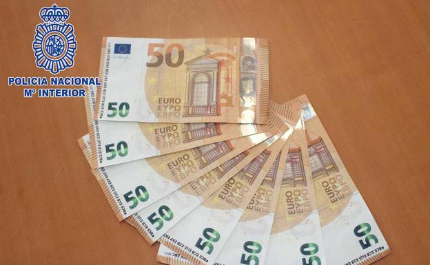 Trata de colar billetes de 50 euros falsos por comercios de Almería