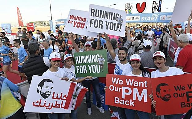 Seguidores de Saad Hariri durante una carrera en apoyo a su regreso al Líbano.