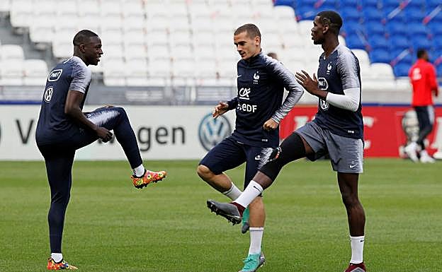 Antoine Griezmann y Paul Pogba, en un entrenamiento. 