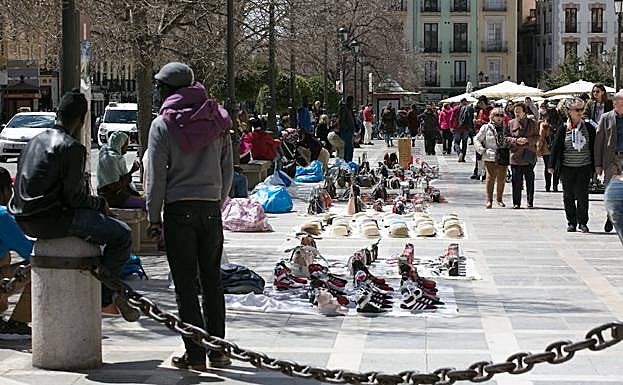 Manteros en Granada.