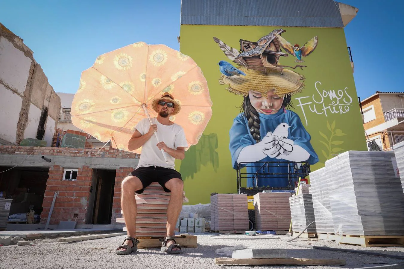 Badi Coloreando «Con sombrilla y a los pies de mi último grafiti»