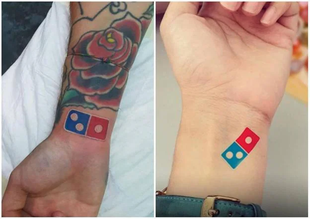  El precio a pagar. Cientos de rusos se grabaron en la piel tatuajes como estos para optar al premio de cien pizzas gratis al año durante un siglo; en cuatro días desbordaron las expectativas de la marca. :: r. c.