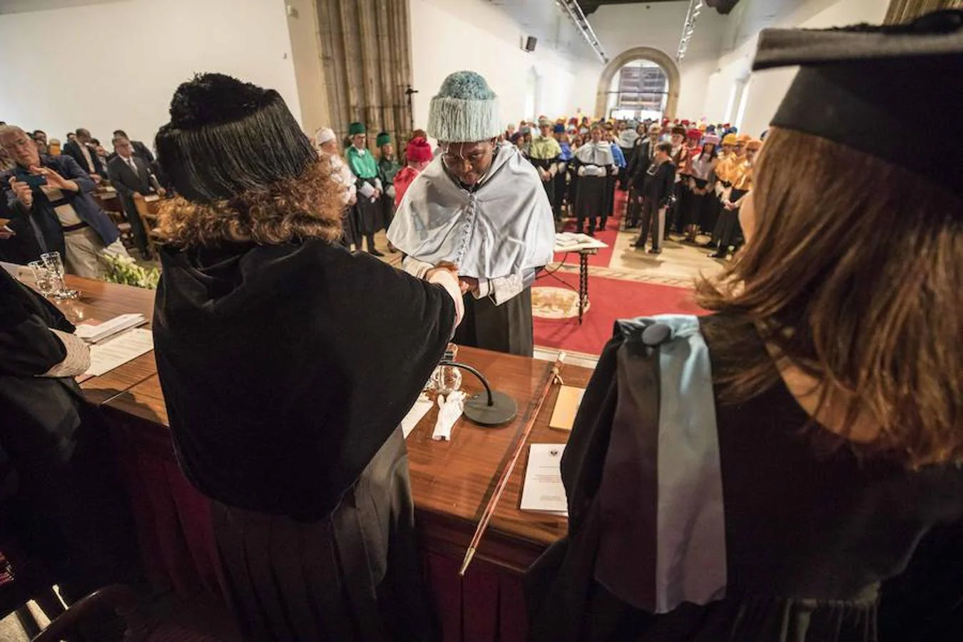 Fotos: La procesión de profesores y estudiantes abre el curso en la UGR