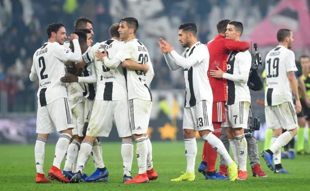 Los jugadores de la Juventus celebran una victoria. 