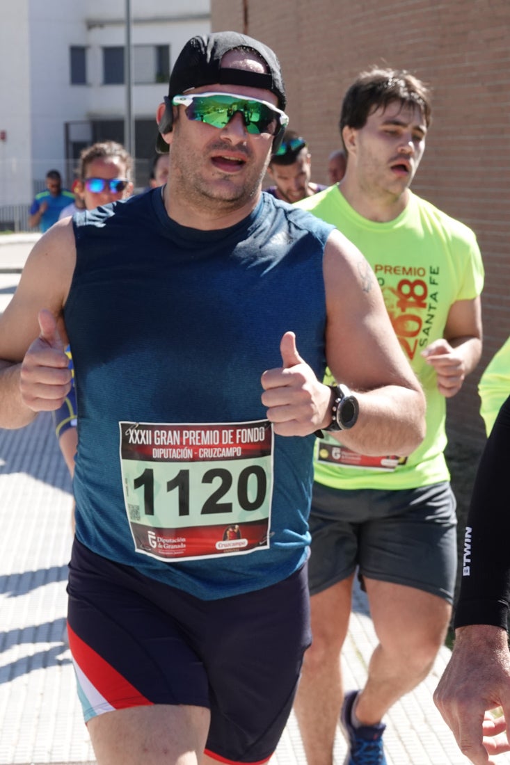 A algunos participantes parece que los 10 kilómetros del reccorido de la prueba de fondo de Loja se les hace leve a tenor de sus sonrisas y buen rollo. Otros en cambio parecen sufrir más o simplemente se concentran para disfrutar de la carrera.