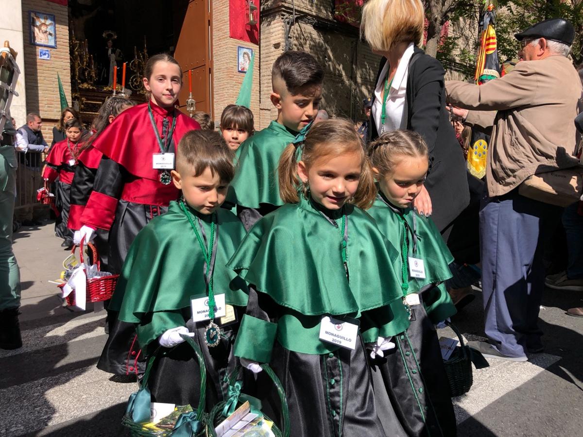 Desde la salida en San Juan de Letrán, la primera cofradía de la tarde del Viernes Santo ha hecho su desfile acompañada por los militares