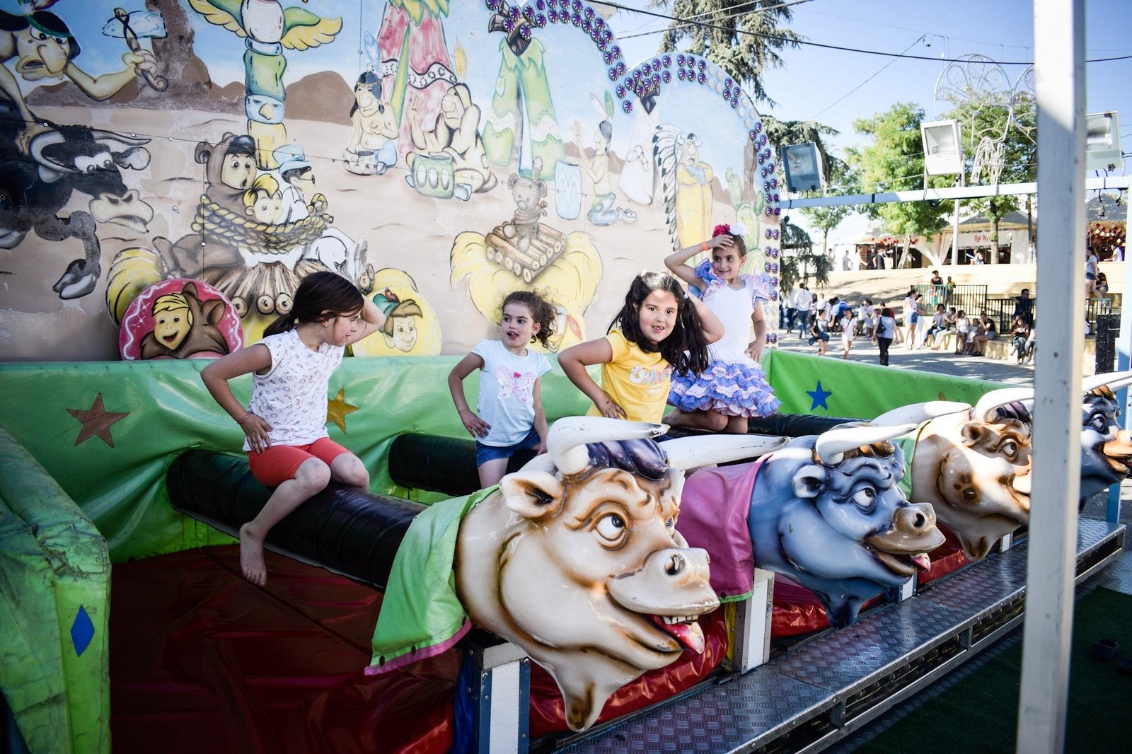 Fotos: Martes de columpios en el ferial