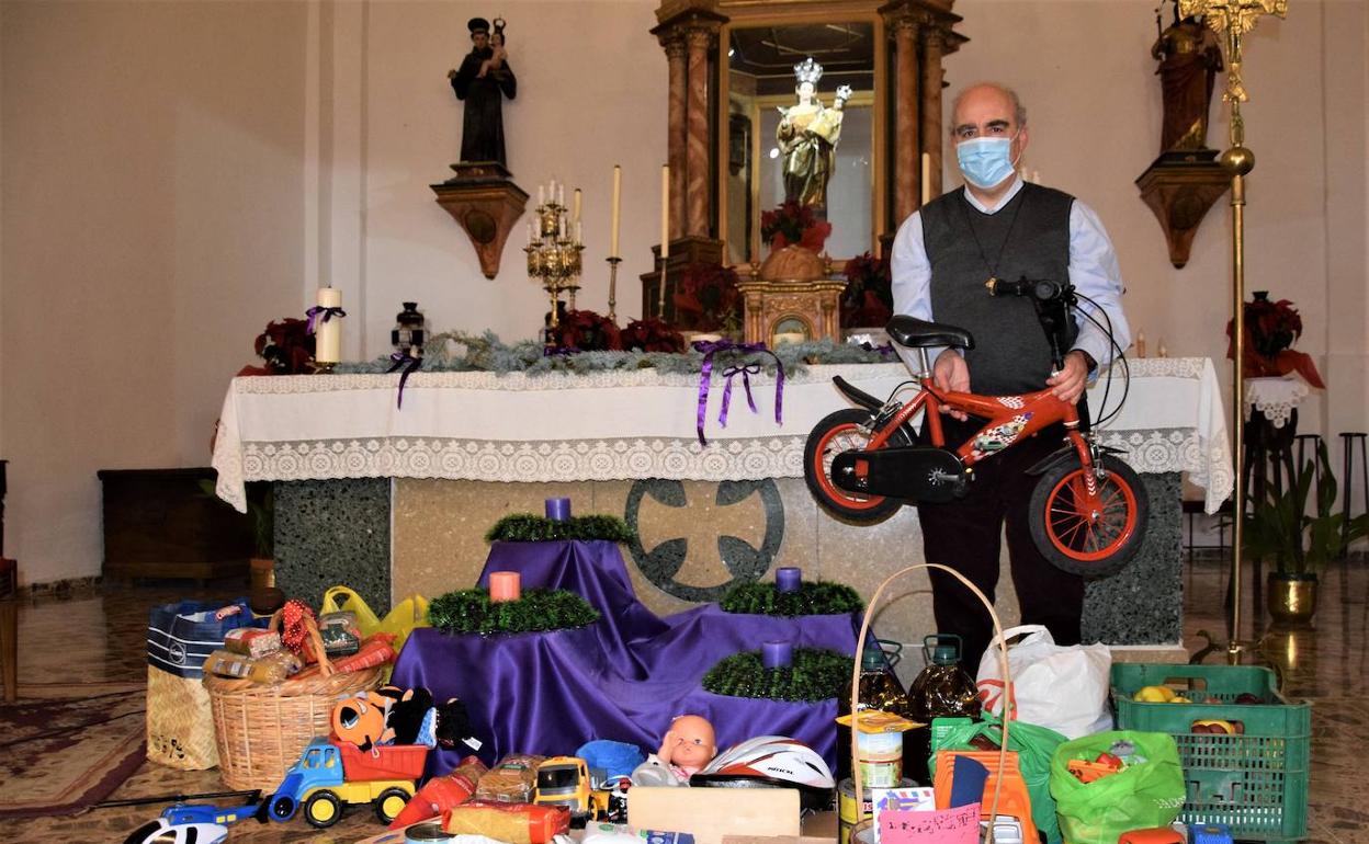 Los niños de catequesis de Capileira y Pampaneira donan juguetes y comida a los niños pobres de la Asociación María de Borja de Granada