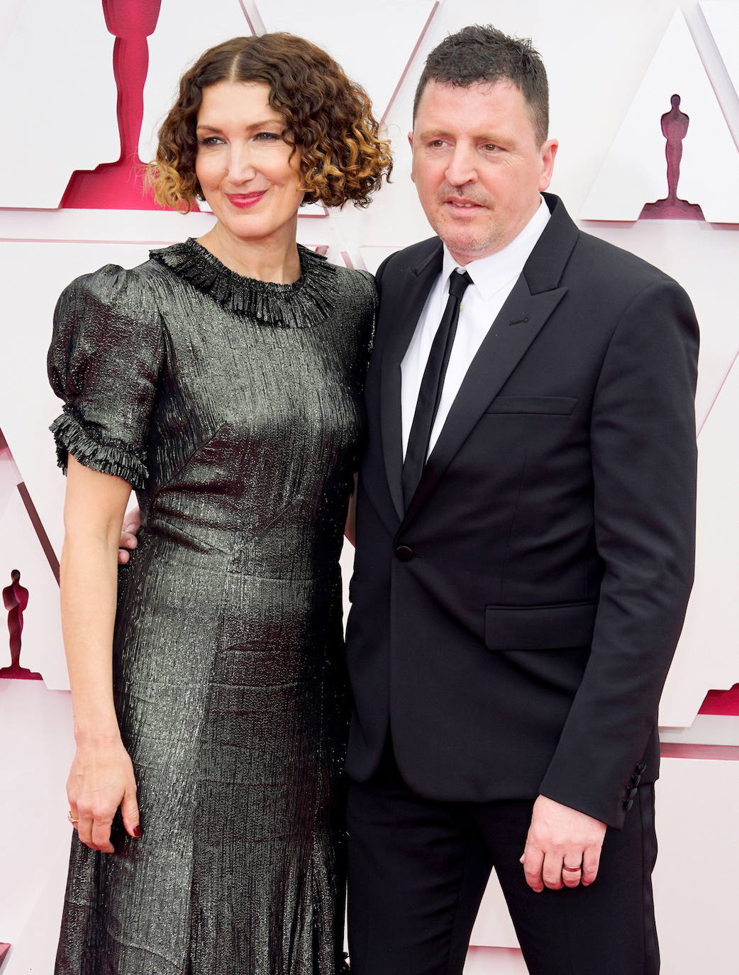 Claudia Sarne y Atticus Ross.