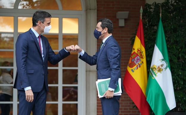 Pedro Sánchez y Juanma Moreno, durante un encuetro en Moncloa.