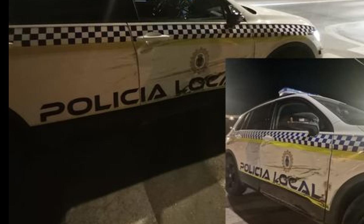 Estado en que quedó el vehículo de la Policía Local de Loja tras ser atacado.