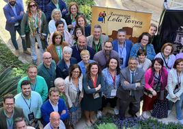 Foto de familia de participantes en la asamblea.