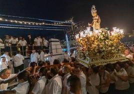 La Virgen del Carmen embarca en el Puerto de Motril.