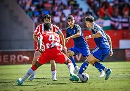 Villar observa a Boyé.