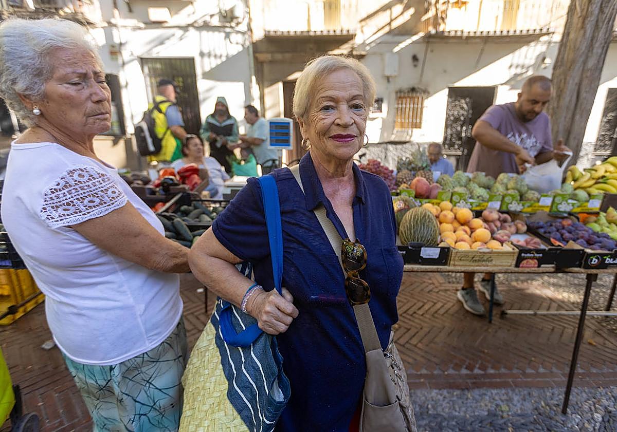 Imagen principal - Tres de las vecinas del barrio. 