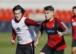 Álvaro Carreras y Kamil Piatkwoski, en el entrenamiento.