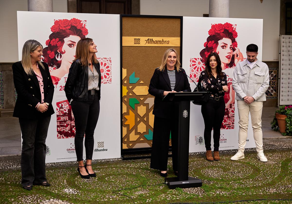 Belén Ortega diseña un cartel del Día de la Cruz con la mujer y el clavel rojo como protagonistas