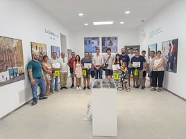 Foto de familia tras la celebración del evento.