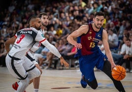 Tomas Satoransky (d) desborda a Gian Clavell.