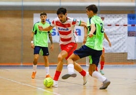 Ataque del Sima Granada en el partido de esta noche en el pabellón Núñez Blanca.