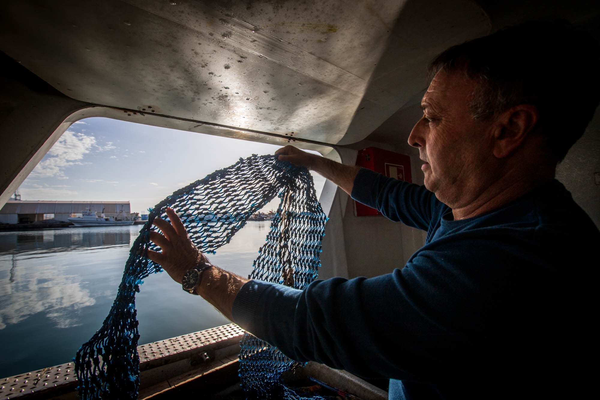 Las estampas de la parada biológica de los pescadores de Motril