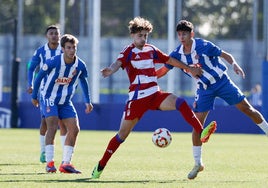 Un lance de la eliminatoria previa entre el Granada y el Espanyol.