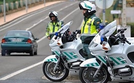 Guardias civiles de tráfico.