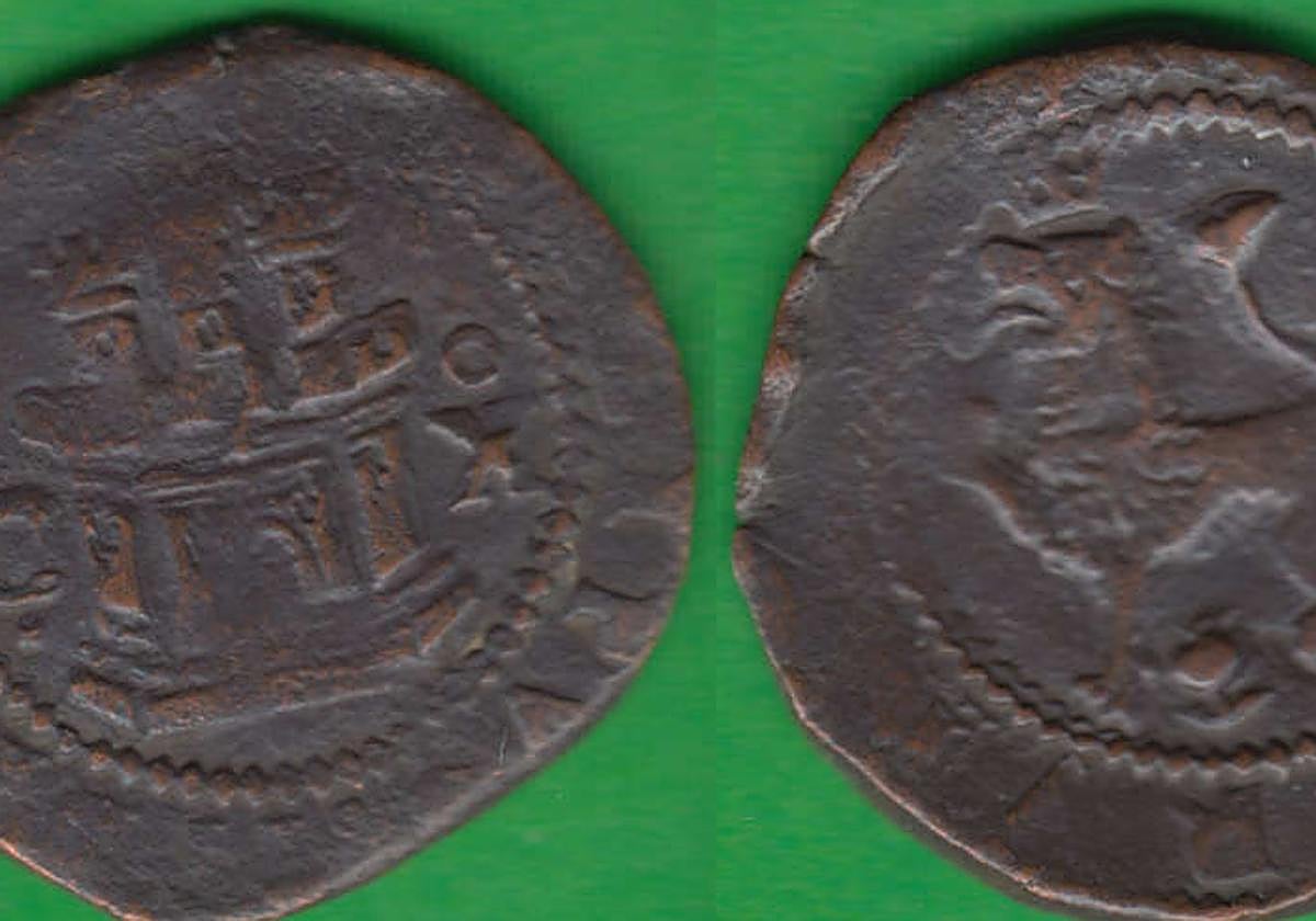 Monedas de la época de Felipe II halladas en La Calahorra.