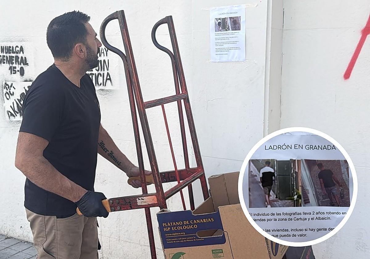 Un comerciante observa uno de los carteles que advierten del ladrón.