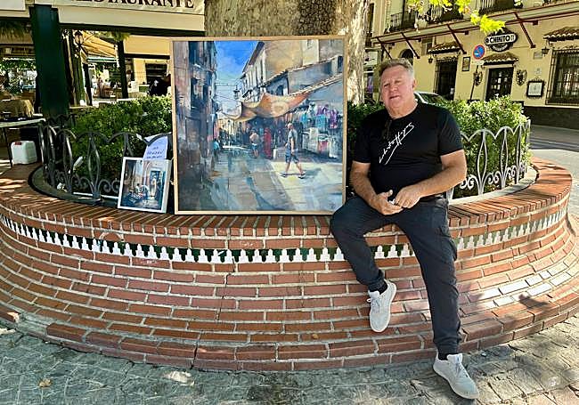 Juan Lucena, con el cuadro.