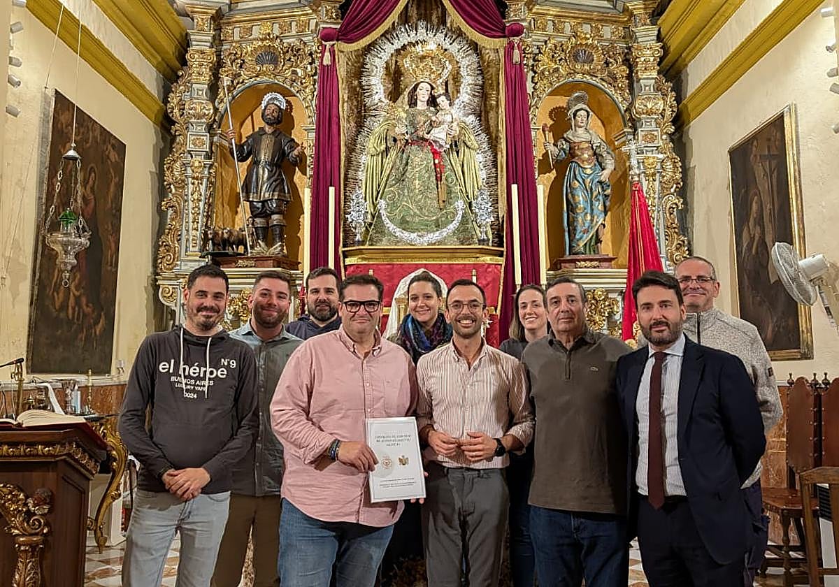 Rúbrica del acuerdo alcanzado con la hermandad de Nuestra Señora de la Granada y la Banda de Armilla