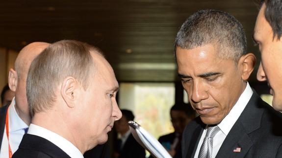Vladimir Putin y Barack Obama.
