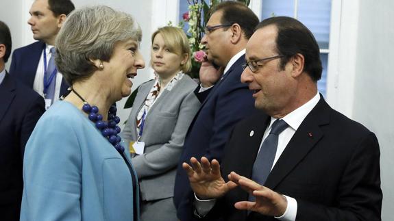May y Hollande.