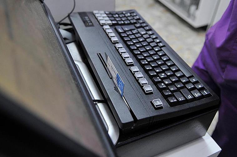 Lector de tarjetas en una farmacia.