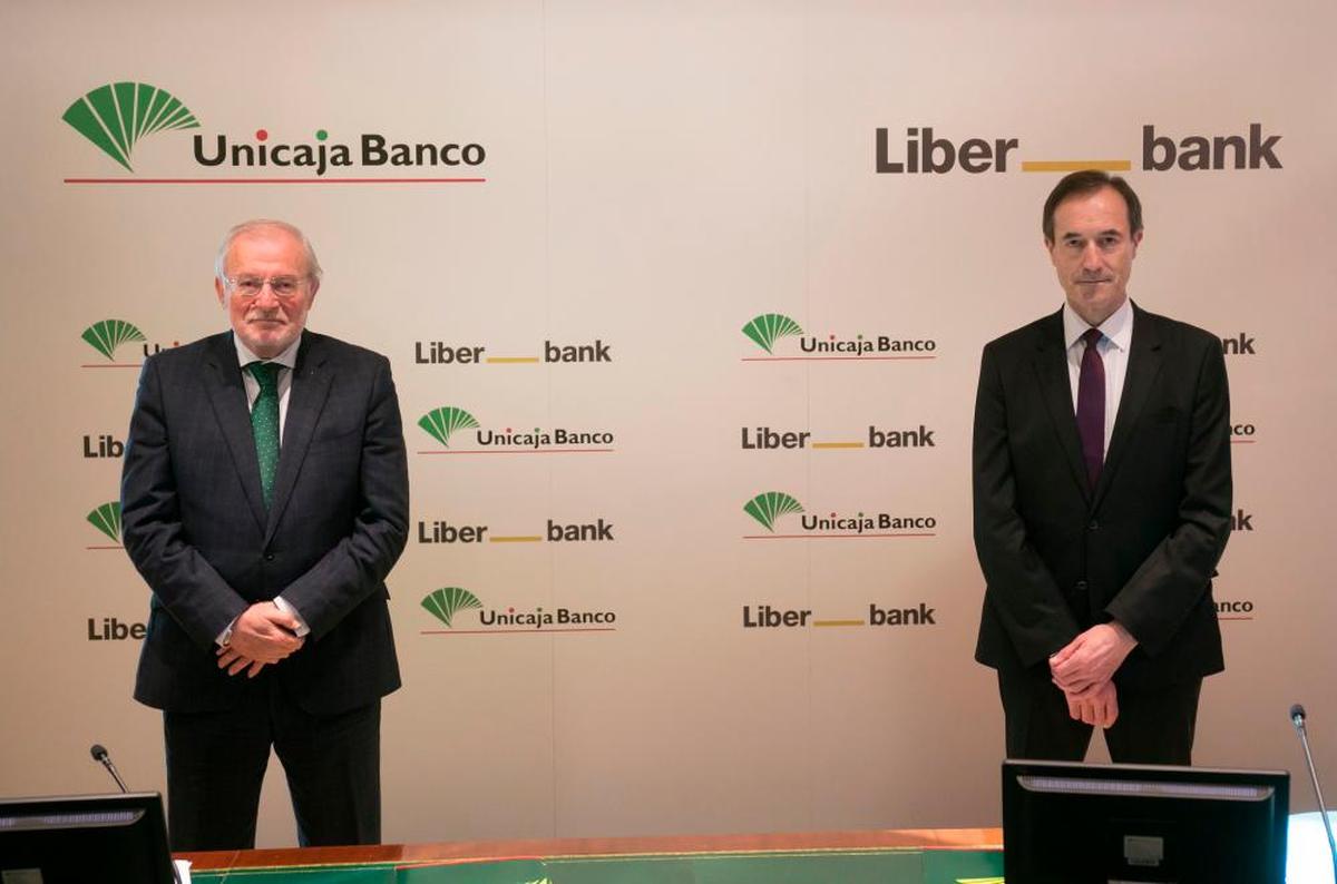 Manuel Azuaga (Unicaja) y Manuel Menéndez (Liberbank).