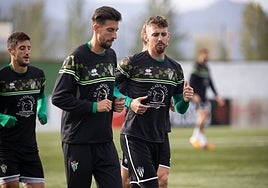 Quintana (derecha) junto a Coque.