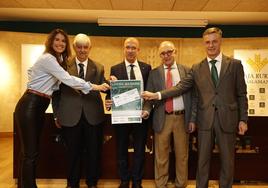 Los representantes durante la presentación en Caja Rural