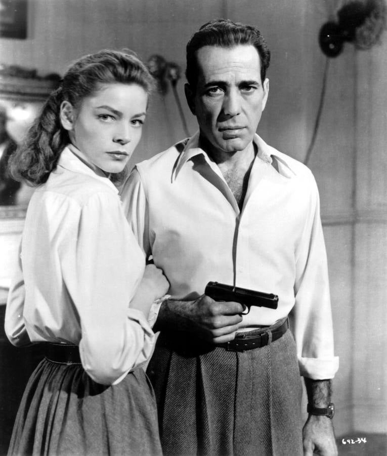 Lauren y Humphrey, pareja perfecta. Lauren Bacall y Humphrey Bogart, en una escena de la película 'El sueño eterno'.