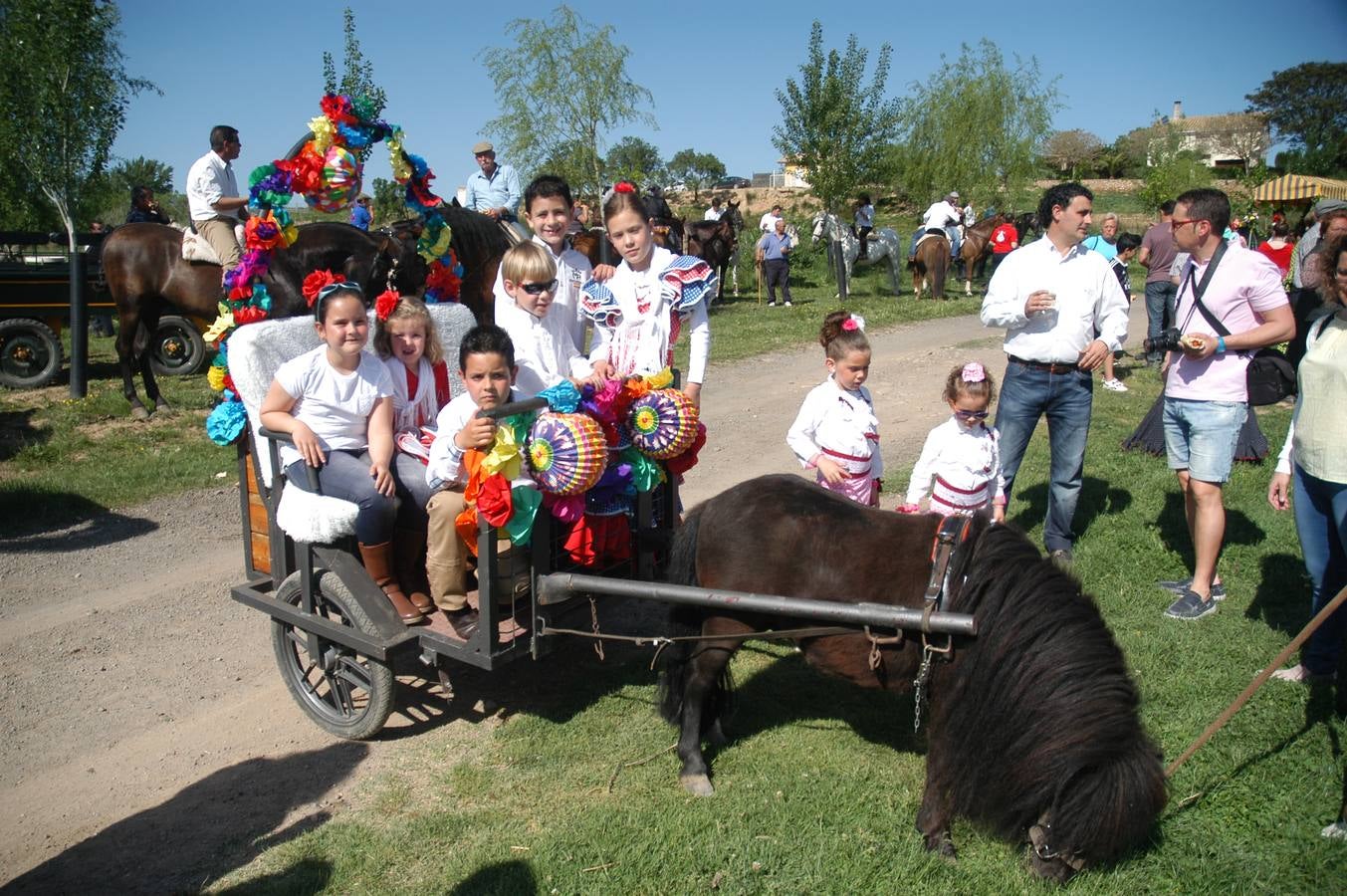 Caballos, carros y rebujito