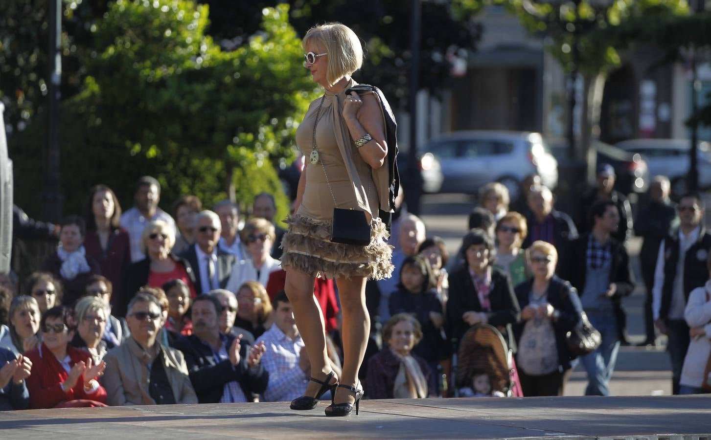 Desfile de Cáritas de ropa recuperada en El Espolón