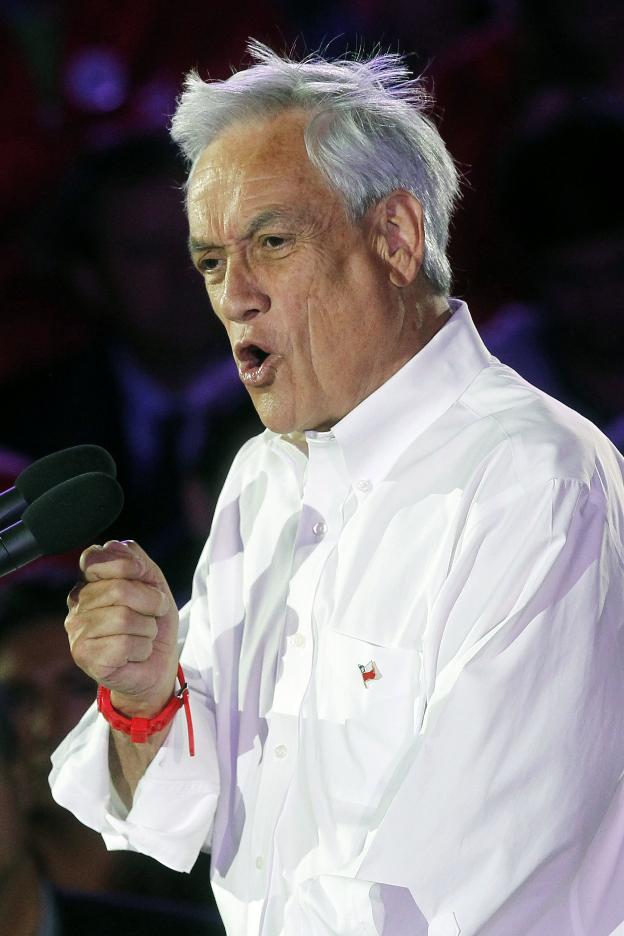 Sebastián Piñera interviene en un mitin electoral. :: CLAUDIO REYEs / afp