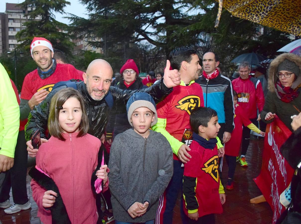 La carrera pasada por agua de papás y pequeños por las calles de la capital